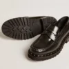 Γυναικεία μοκασίνια τύπου loafers με χοντρό τακούνι από μαύρο δέρμα με καρφιά