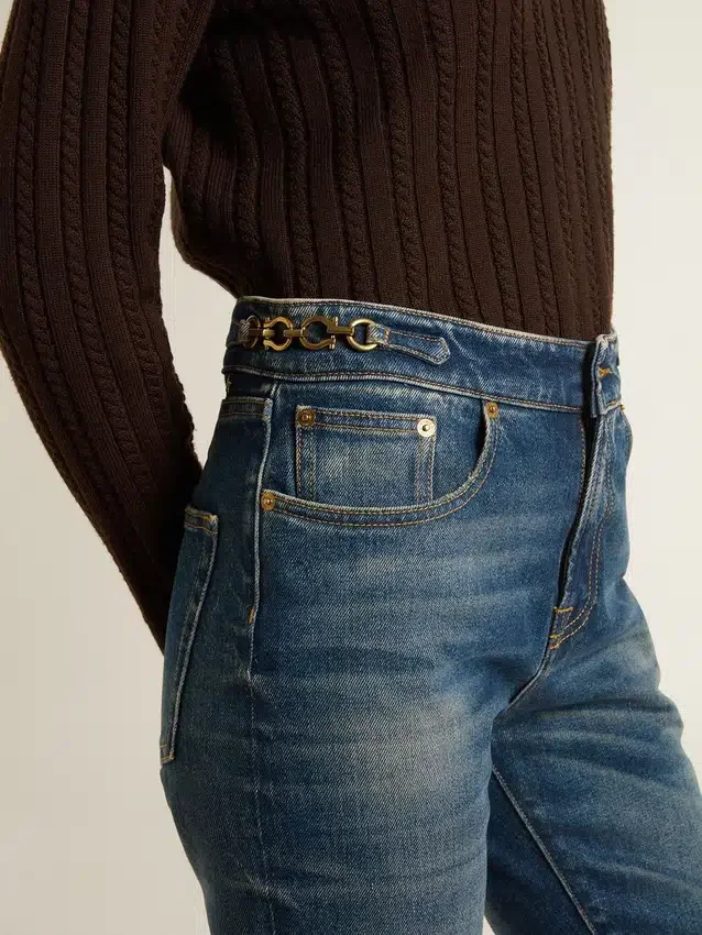 Γυναικείο τζιν με bootcut γραμμή, vintage πλύση και μεταλλικές λεπτομέρειες