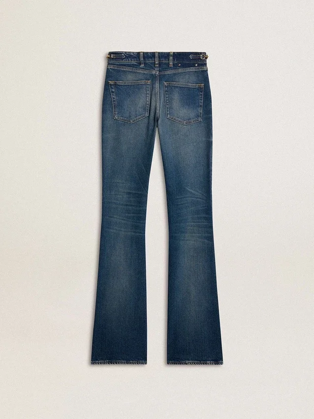 Γυναικείο τζιν με bootcut γραμμή, vintage πλύση και μεταλλικές λεπτομέρειες