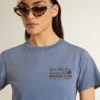 Γυναικείο ξεθωριασμένο ανοιχτό μπλε T-shirt με τύπωμα στο στήθος