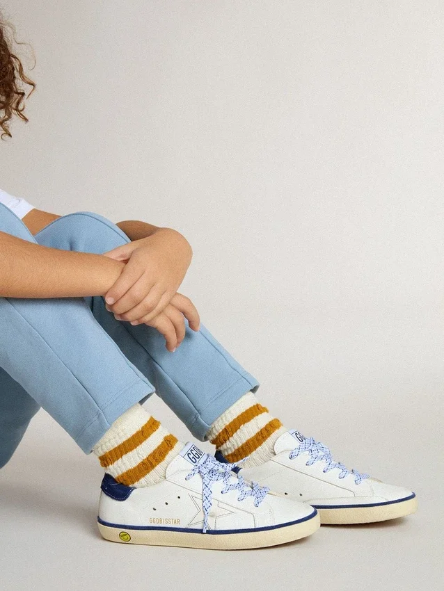 Junior Super-Star σε λευκό δέρμα με μπλε σουέτ λωρίδα στη φτέρνα