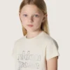 Παιδικό T-shirt «Journey» για κορίτσια από λευκό βαμβακερό τζέρσεϊ με ασημένια καρφιά