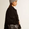 Star Bag από γυαλιστερό μαύρο δέρμα με αστέρι σε τόνους του ίδιου χρώματος
