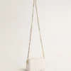 Star Bag «Mini» από δέρμα σε χρώμα βουτύρου-λευκό με αστέρι σε τόνο-πάνω-τόνο