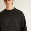 Unisex φούτερ από φθαρμένο μαύρο βαμβάκι με κεντημένο λογότυπο
