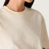 Unisex πουκάμισο «Star» από λευκό βαμβάκι με κρύσταλλα σε ντεγκραντέ σε όλη την επιφάνεια και τύπωμα στην πλάτη